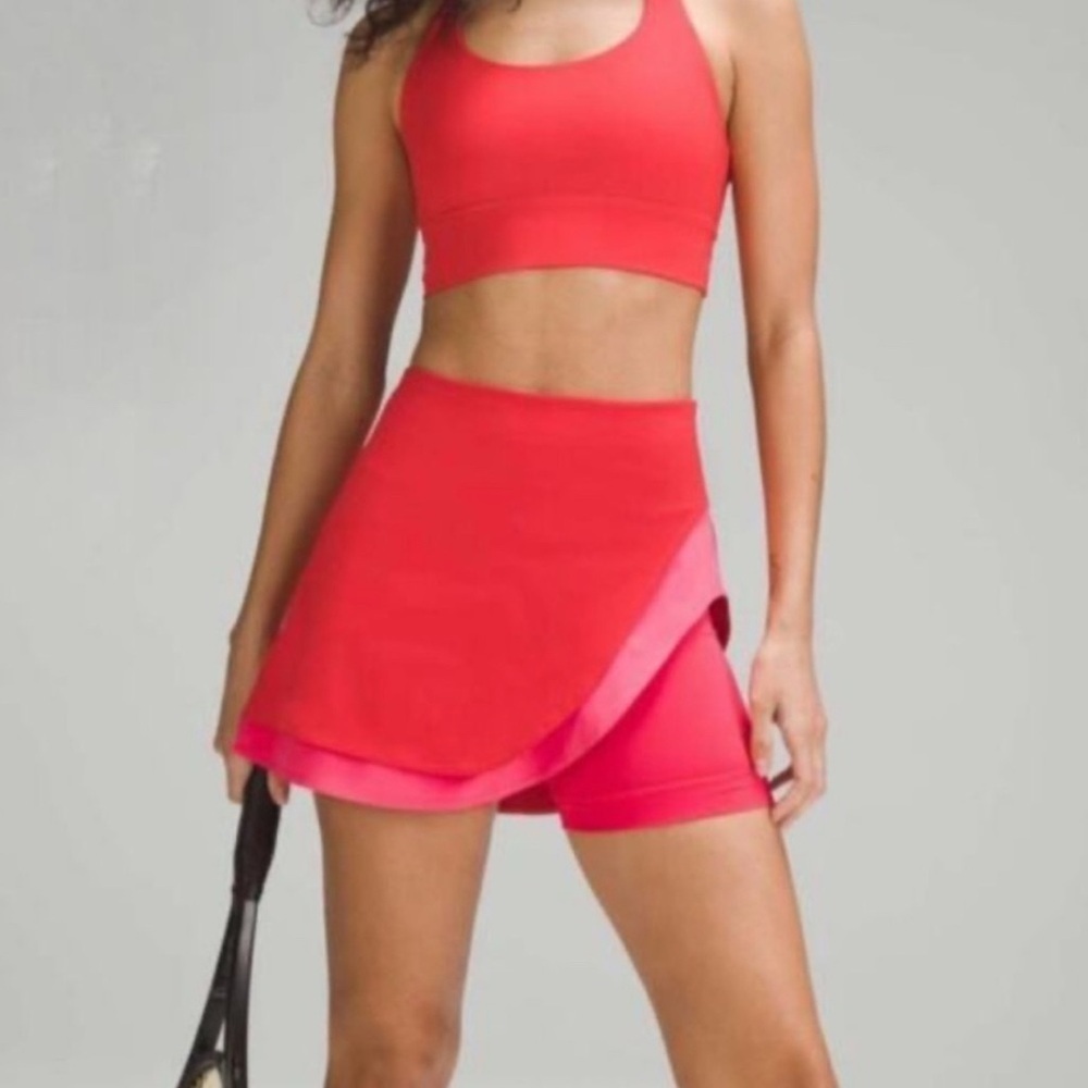 Lululemon sz 0 asymmetrical layered high rise tennis skirt in red pink layers